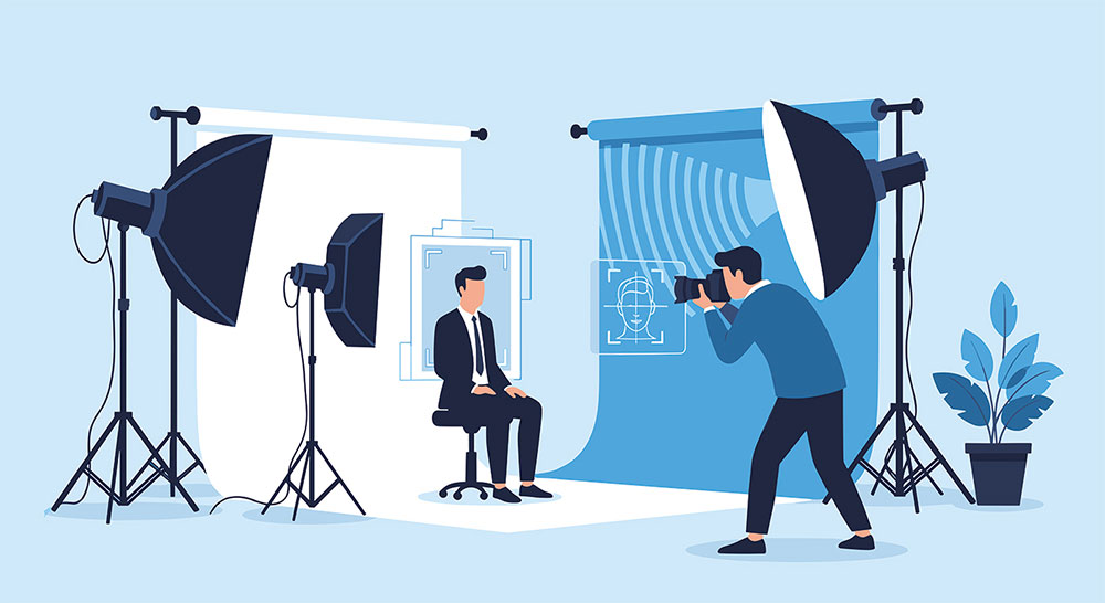 Illustration of a headshot studio with softbox lighting, a seated subject in a suit, and a photographer