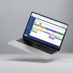 Laptop displaying the 17hats Pipelines board with client cards sorted into colored stage columns